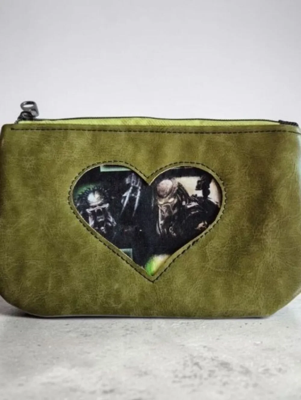 Olive green heart pouch w/ alien hunter appliqued on front pouch